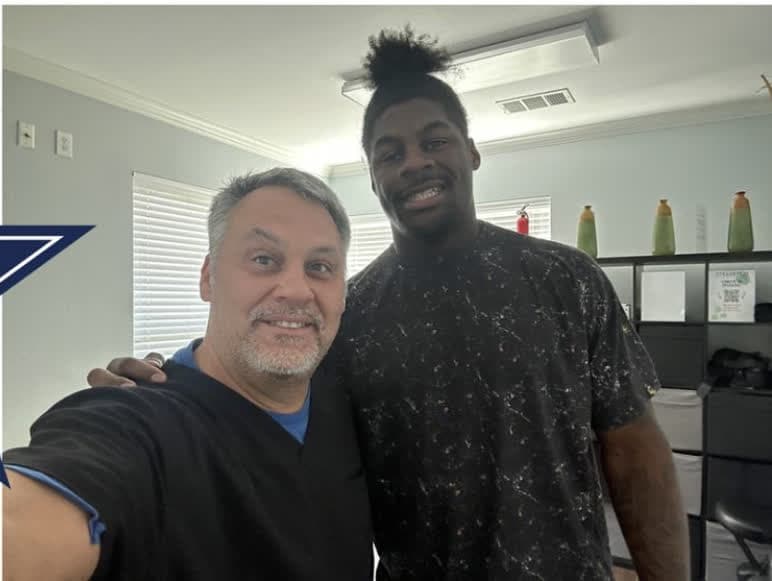Damone Clark with a Strrretch practitioner at the Frisco studio